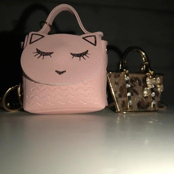 Group of four keychains or/and purse charms. - Picture 3 of 9